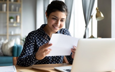 woman looking at statement